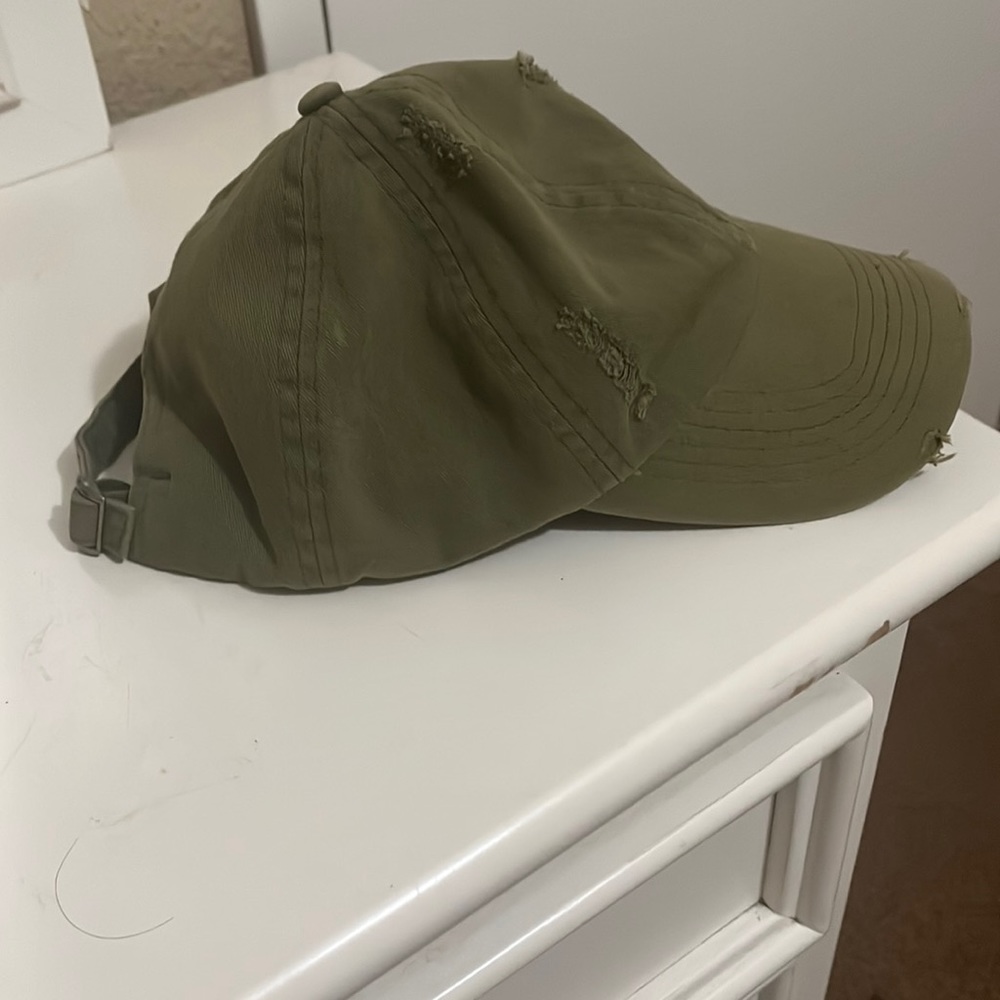 Olive green cap with ripped embroidery